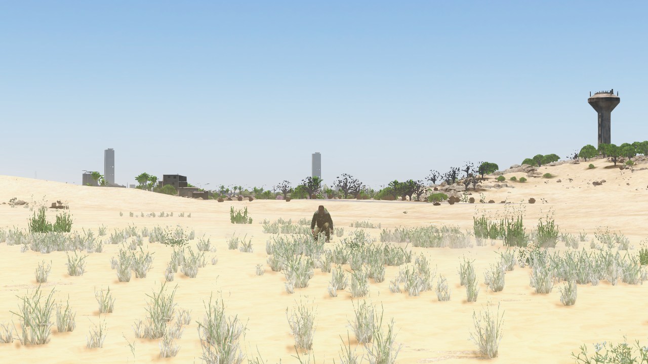 A crouched survivor among desert grass with a water tower on the horizon